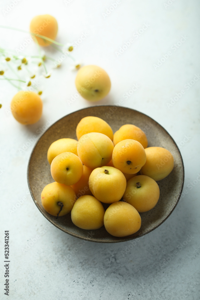Fresh ripe apricots in a bowl