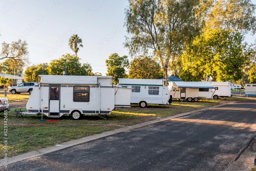RV caravans camping at the caravan park. Camping vacation family travel RV caravans camping at the caravan park. Camping vacation family travel