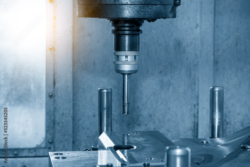 The CNC milling machine rough cutting the press die parts by indexable tools. The CNC milling machine rough cutting the press die parts by indexable tools.