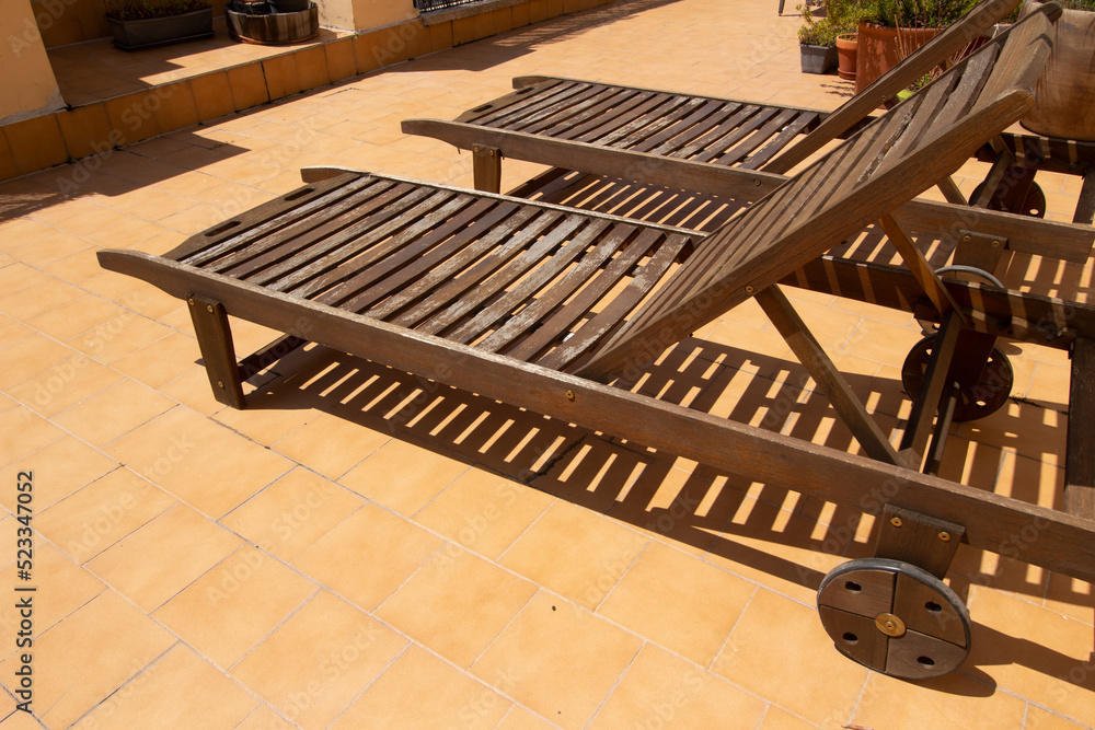 wooden sun chairs for terrace sunbathing