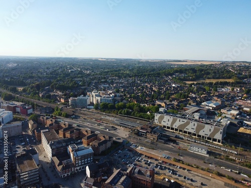 High Angle Drone's View of Luton City Center and Railway Station, Luton England. Luton is town and borough with unitary authority status, in the ceremonial county of Bedfordshire photo