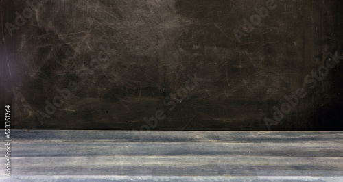 Back to school template. School blank empty black board and blue wooden table