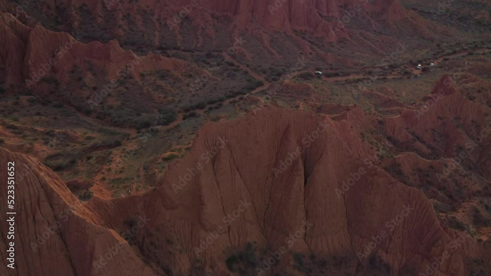 Mars Canyon in Issyk Kul Region in Kyrgyzstan. Epic sand formation. Mountains. Drone movement 4K. Mars Canyon in Issyk Kul Region in Kyrgyzstan. Epic sand formation. Mountains. Drone movement 4K.