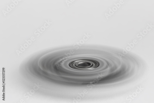 Spinner in motion with blurred blades on white background