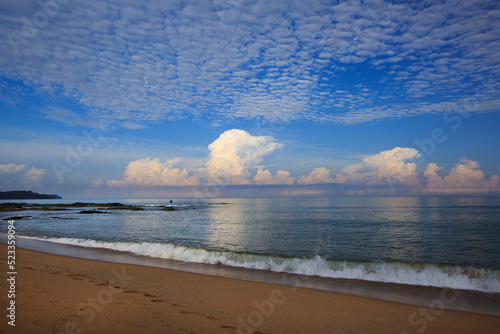 White cumulus clouds in sky over blue sea water landscape, cloud above ocean panorama, horizon, beautiful tropical sunny summer day seascape panoramic view, cloudy weather, cloudscape, copy space