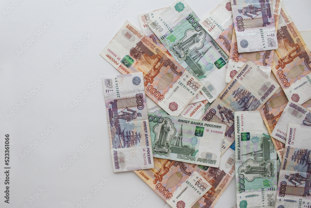Various Russian banknotes on a light background with space for text. Various Russian banknotes on a light background with space for text.