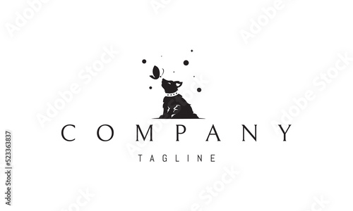 Vector logo on which an abstract image of a cute puppy with a butterfly sitting on its nose.