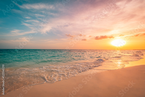 Fototapeta Naklejka Na Ścianę i Meble -  Closeup sea sand beach. Panoramic beach landscape. Inspire tropical seascape horizon. Orange and golden sunset sky clouds. Tranquil relaxing freedom beach shore happy romantic meditation summer nature