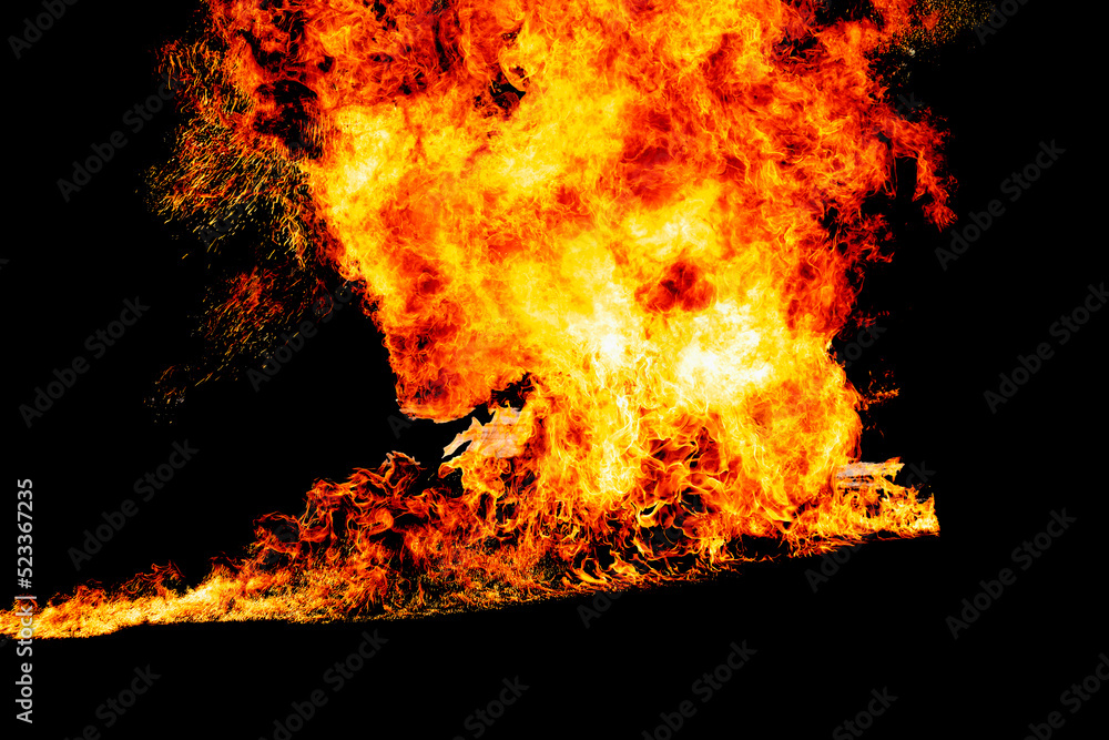 Obraz premium Abstract fire flames isolated on a black background.