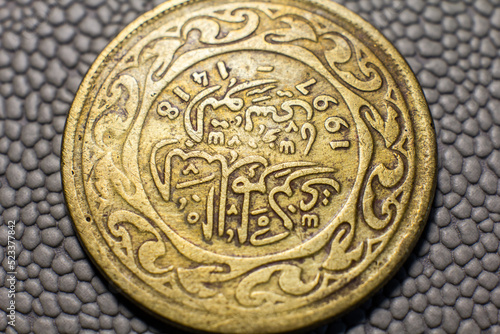 Coin of Tunisia 100 millimes close-up photo
