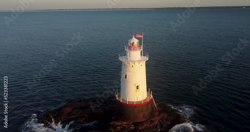 07/10/2022 - Little Compton, RI USA - Early morning video of the Sakonnet Point Light (West Island Light) between Little Compton and Tiverton Rhode Island, at Sakonnet River and Atlantic Ocean.	 photo