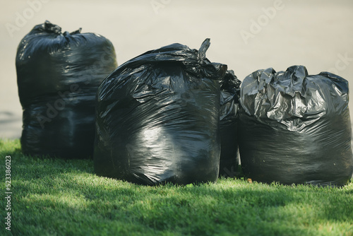 garbage bags in the park photo