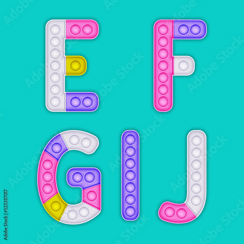 Children's pop it alphabet. A set of realistic antistress toys in the form of an letters.