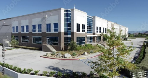 4K Aerial View of New Commercial Industrial Building.
