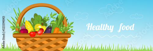 Wicker basket with different vegetables outdoors