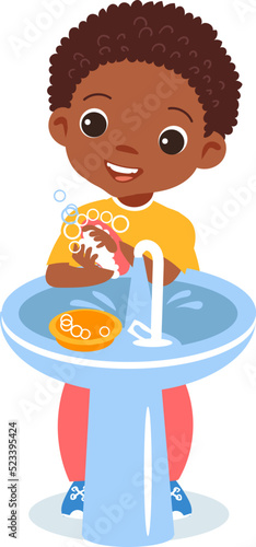 Black boy rubber hands with soap. Child handwashing