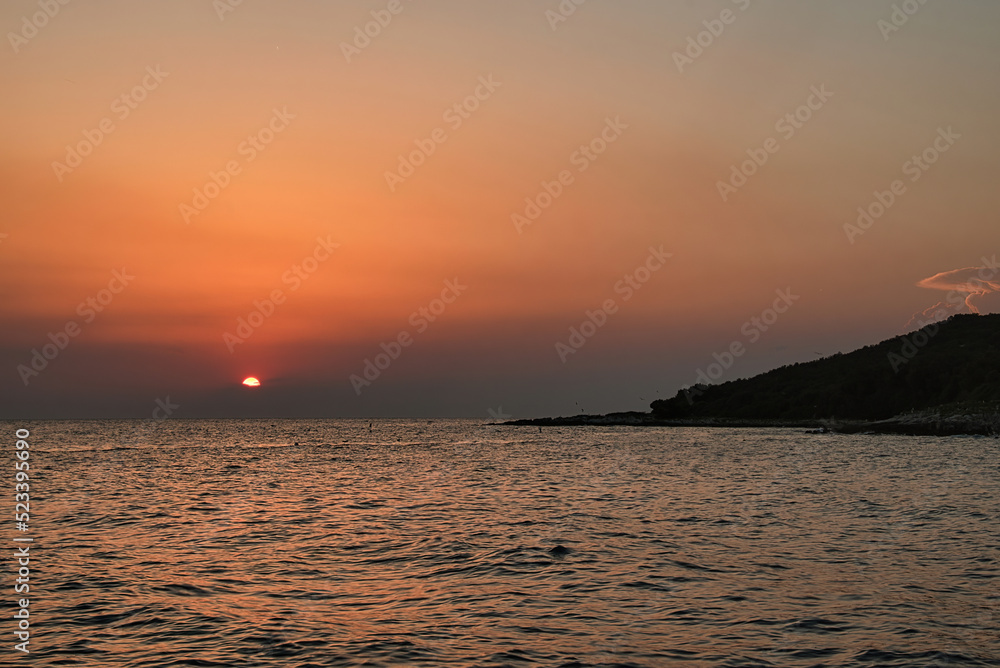  Sonnenuntergang hinter der Insel 