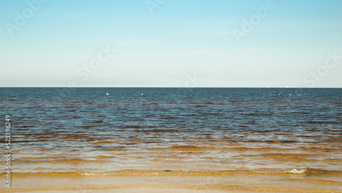 Fototapeta Naklejka Na Ścianę i Meble -  the sea. in the photo, the sea in close-up against the blue sky in summer