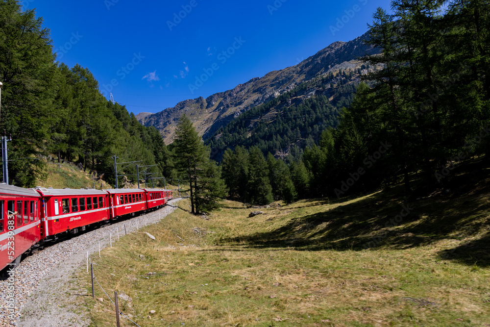 The red train, Bernina Express, on road