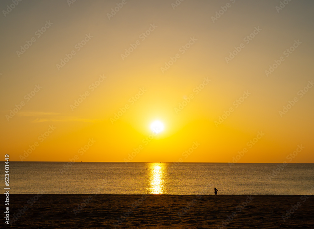 Beach sunset or sunrise with colorful of cloud sky and sunlight