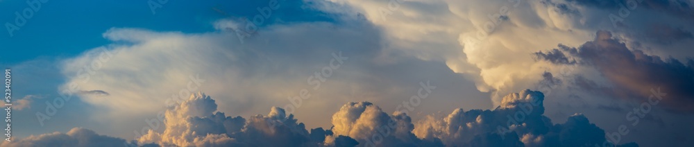 Sky panorama. Beautiful dramatic big clouds in the sky. Landscape of the power of heaven and nature. Copy space Sky panorama. Beautiful dramatic big clouds in the sky. Landscape of the power of heaven and nature. Copy space