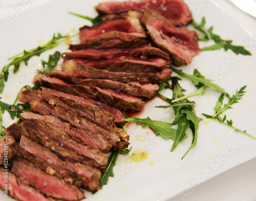 Roastbeef. Entrecote. Beef. Main courses: Fillet with rucola and extravirgin oil. Italian cuisine