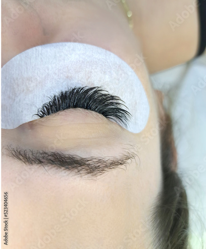 Close up of eyelash Extensions mega volume kim k wet effect photo