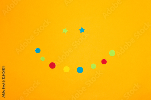 colorful smile on yellow background, creative art modern design laughing day

