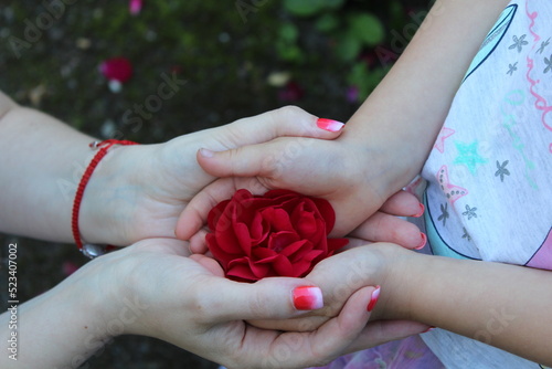 hands of the woman and the child