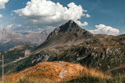 The path in mountain hills in Swiss Alps. Scenic landscape
