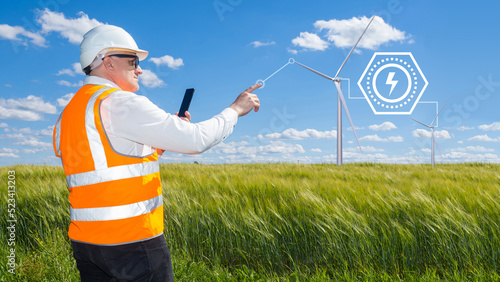 Engineer works at wind farm...