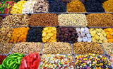 Counter with oriental food in east market. Dried fruits, sweets and nuts at bazaar