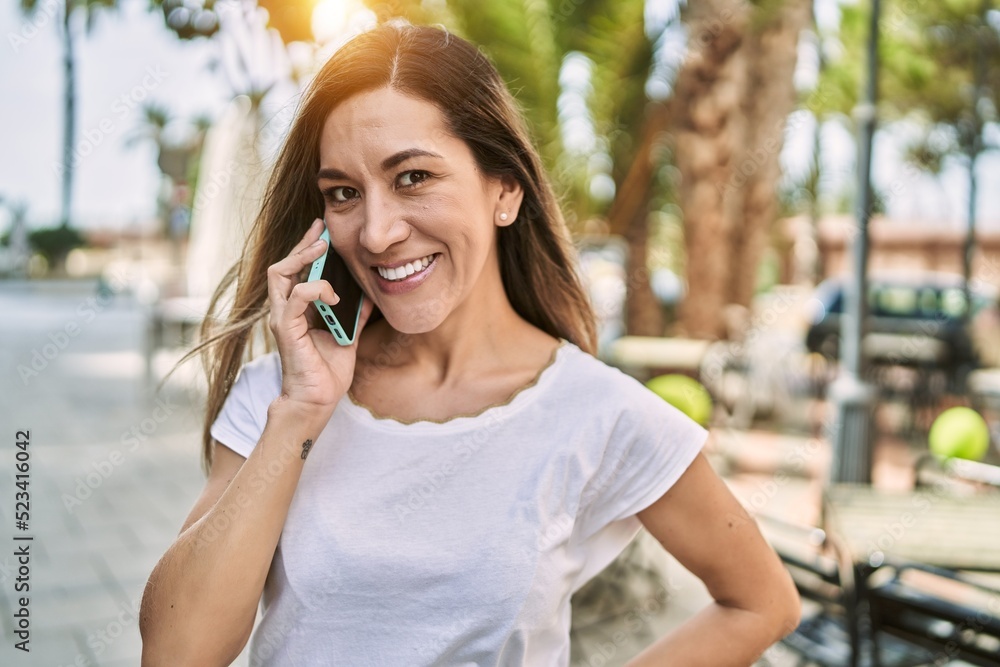 Young hispanic woman smiling confident talking on the smartphone at park Young hispanic woman smiling confident talking on the smartphone at park