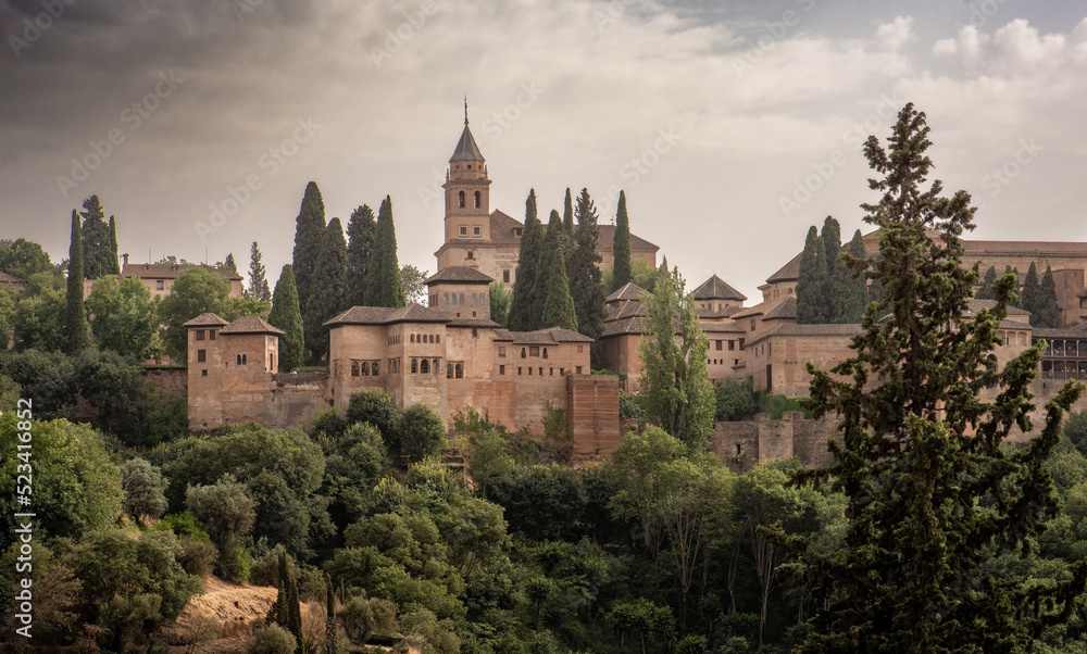 The ancient arabic fortress Alhambra at beautiful evening time, Granada, Spain. A European travel landmark and most visited monument in all of Spain	