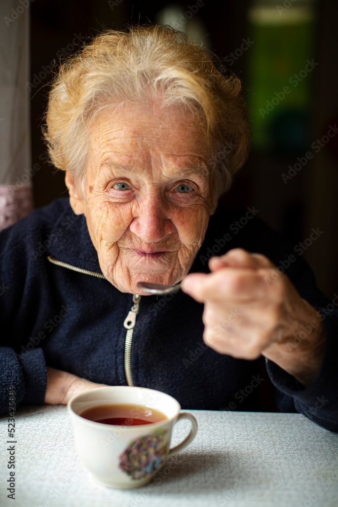 Grandmothers with a cup of tea in the house. Grandmothers with a cup of tea in the house.