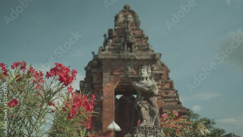 Beautiful Balinese Hindu Temple and Statue at Kertha Gosa Semarapura Klungkung Bali Indonesia photo