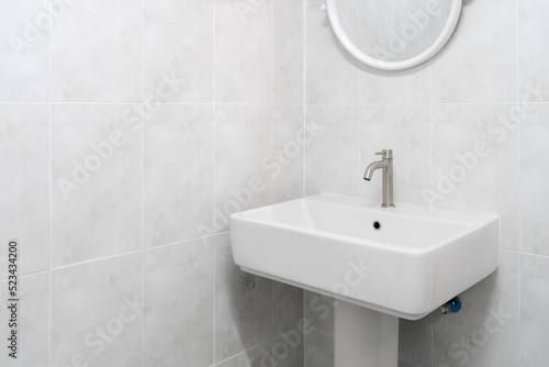 фотографія white sink in bathroom