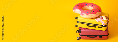 Suitcases and beach accesso...