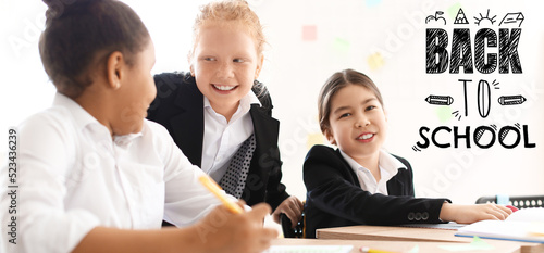 Cute little students during...