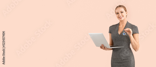 Female real estate agent wi...