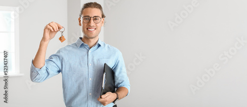 Male real estate agent with...