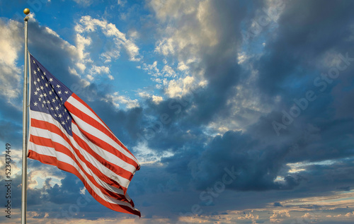 Sign of patriotism of American USA flag waving on flagpole
