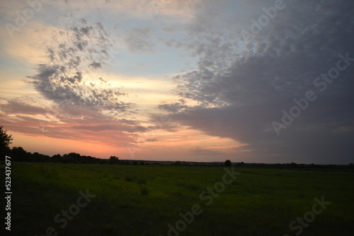 Clouds in a Sunset Over a Farm Field