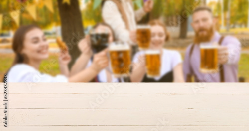 Empty white wooden table an...