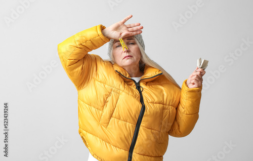 Ill mature woman with cloth...