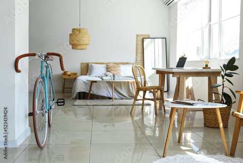 Interior of light bedroom w...