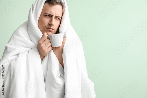 Sleepy young man with blank...
