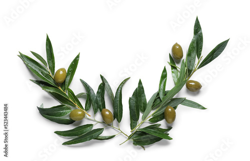 Green olives with leaves on white background