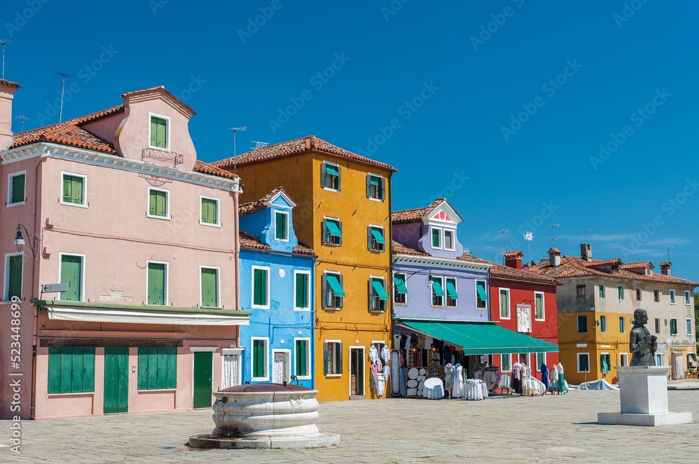 Exterior of colorful residential house in Burano island, Venice, Italy