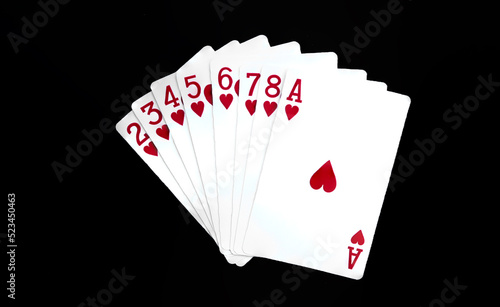 Royal playing cards on a black background.